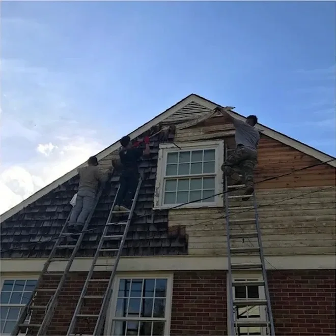 Cedar shake gable and trim after exterior painting in Nashville TN