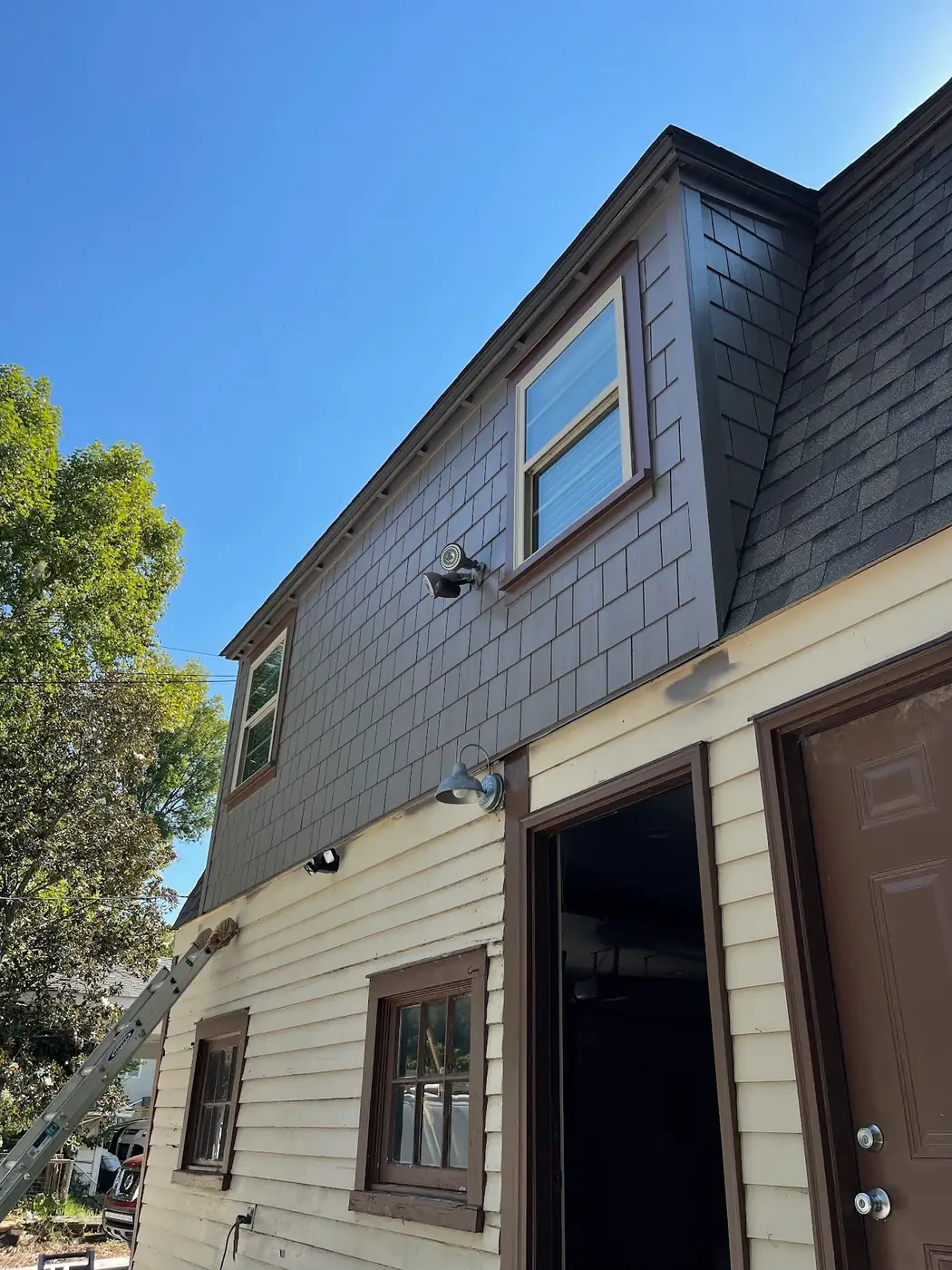 Cedar shake gable repainted taupe during an exterior job in Nashville TN