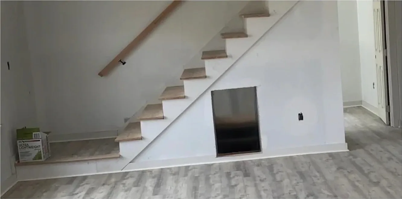 Staircase treads and stringers before painting in an Antioch TN home