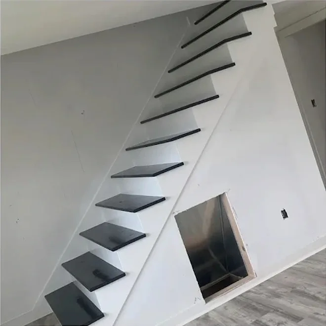 The same staircase with black treads and white risers after painting in Antioch TN